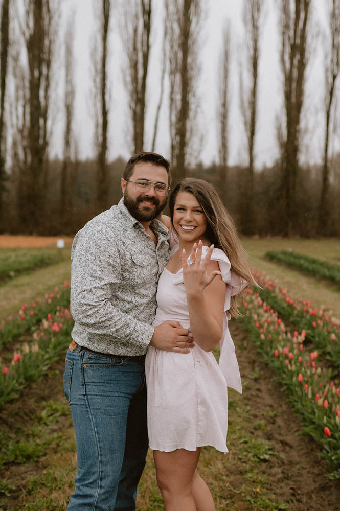 Couple engaged in the Tulip Fields at Tulip Valley Farms