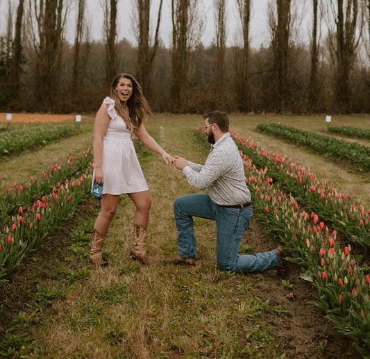 A proposal at Tulip Valley Farms during Tulip Festival