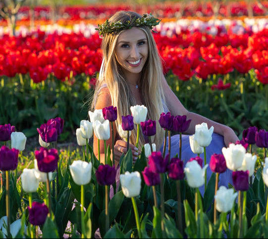 Woman in the field at Tulip Valley Farms during the Skagit Valley Tulip Festival