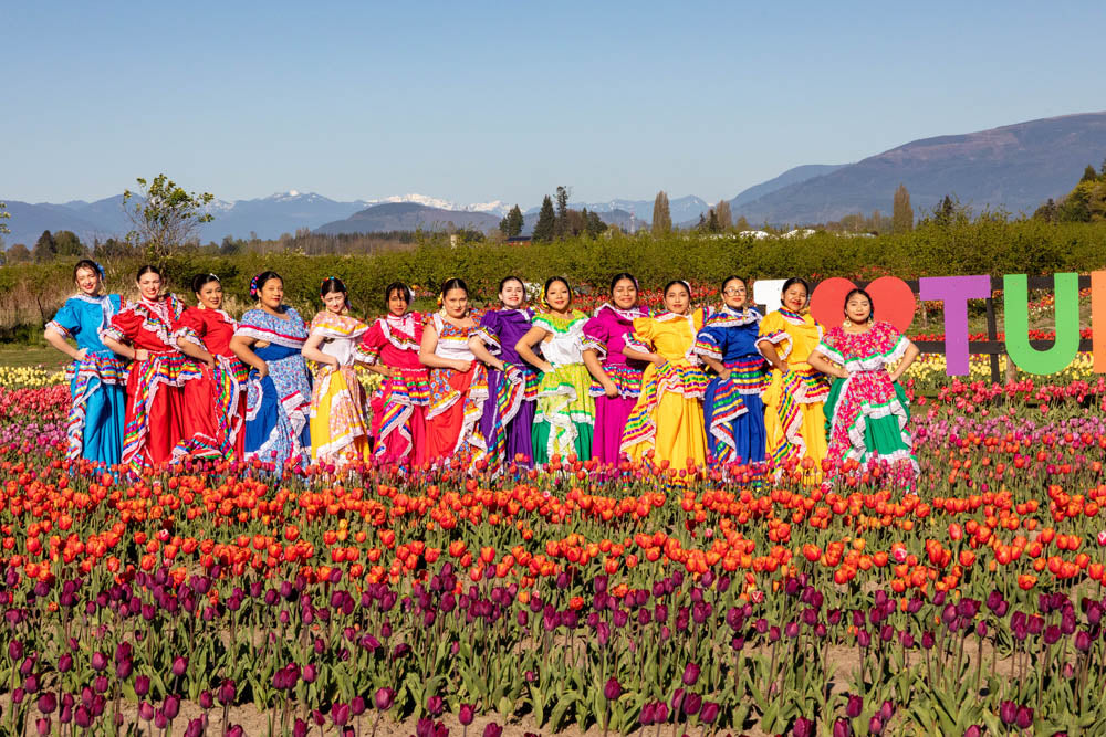Traditional dancer group in the Tulip Fields at Tulip Valley Farms