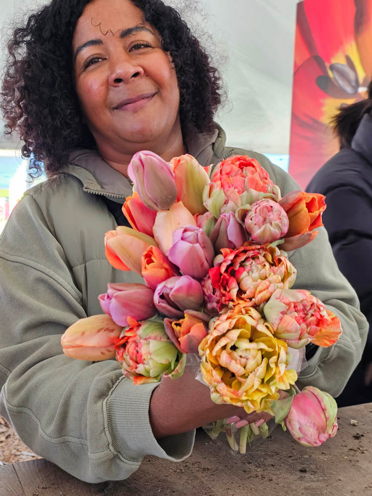 Tulip Valley Staff member with U-Pick Bouquet