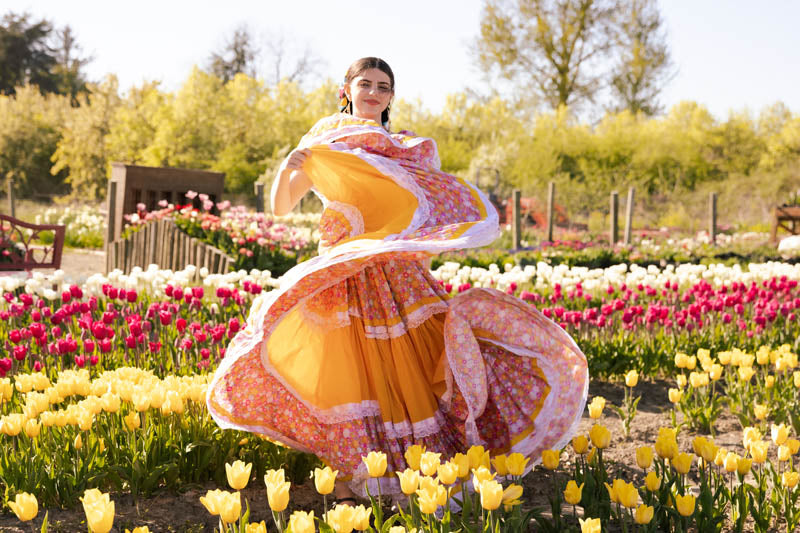 Traditional dancer in the tulip field